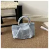 Bolso de nicho para mujer súper popular, nuevo bolso cruzado de moda de principios de otoño 2026, bolso de mano de alta gama con pliegues tipo nube