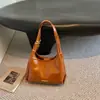 2026 Nova Bolsa de Mão Simples Casual Cor Sólida Estilo Coreano Grande Capacidade Bolsa de Ombro Retrô Fashionável Chique Estilosa Tendência