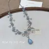 Colar com Pingente Flor Azul Estrelada, Temperamento de Luxo Leve, Corrente para Clavícula Estilo Socialite, Corrente de Pescoço Moderna e Versátil
