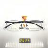 8807 Gafas de montura media casual de negocios para hombre al por mayor marco de gafas semi-titanio ultraligero pierna de gafas de acero plástico súper elástica resistente