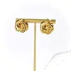 Diseño de Nicho Minimalista Francés Dorado Liso Estilo Fresco Redondos Lisos Flor de Rosa Retorcida Tridimensional Aretes de Tachuela