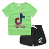 Camiseta de cuello redondo para niños, pantalones cortos, camiseta informal coreana, conjunto de camiseta interior absorbente de sudor, de caramelo, de verano 2023