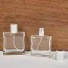 Botella dispensadora de perfume de 30 ml Botella de perfume de alta gama de 50 ml Tapa plateada de rosca Botella de perfume Botella de muestra de perfume de marca reconocida