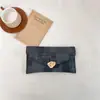 Estilo de Deslocamento Transfronteiriço 2026 Novo Modelo Casual Simples Moderno Grande Capacidade Clutch Envelope Bolsa Feminina