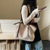 Bolsa de mano casual estilo coreano para mujer, nuevo modelo 2026, bolso de hombro simple y moderno para mujer, bolso de mano versátil