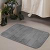 Alfombra al por mayor de fábrica de felpa coral absorbente tapete para puerta de baño tapete para pies de entrada