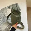 Bolso pequeño de moda para mujer 2025 nuevo bolso de pecho primavera-verano, bolso de hombro cruzado a la moda, bolso de tela casual personalizado, bolso para teléfono móvil