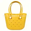 Personalización de fábricaBolsa perforada de EVA de gran capacidad personalizada en stock, bolsa de playa bogg, bolso de mano de lujo ligero para mujer