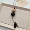 Nuevo Collar de Semillas de Plantas Estilo Chino con Forma de Corazón y Cuentas para Mujer, Colgante, Cadena para Suéter, Lujo Ligero y Sensación de Alta Gama