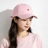 Gorra de visera de pato de color liso bordada con corazón, gorra de béisbol vintage de copa suave, sombrero de sol versátil unisex al por mayor