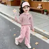 Conjunto de rayas con capucha y manga larga para niña, primavera y otoño, nuevo estilo coreano 2026, pantalones casuales, un conjunto de dos piezas súper lindo