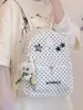 Mochila clásica estilo universitario de lunares con conejito, color salmón fresco y discreto, para niñas, adecuada para estudiantes de secundaria y preparatoria, versátil para ir al campus.