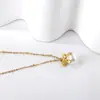 Otoño europeo y americano nuevo personalidad creativa exquisito simple acero inoxidable dorado lazo cruz moda transfronteriza caliente collar de perlas