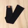 Jeans Negros de Corte Bootcut Ajustados para Mujer Otoño e Invierno 2025 Nuevos de Cintura Alta Elásticos Efecto Adelgazante Pierna Ancha Pantalones Acampanados Forrados de Polar