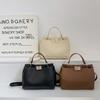 Bolso de hombro cruzado de moda europeo y americano simple con cierre, textura ins, personalidad, cubo casual para mujer, bolso con cierre giratorio