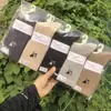 26 Meias Femininas para Outono Inverno Meia-Panturrilha Folgadas Meias de Pelo de Camelo Aquecimento Feminino Outono Inverno Atacado
