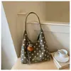 Bolso de mano de diseño de alta gama estilo coreano, lujo ligero con lunares, adecuado para ir al trabajo, casual y versátil, bolso de hombro y cruzado exquisito