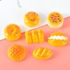 Nuevo producto serie moño de resina comida para jugar accesorios para snacks mini escena de cocina para crear adornos en miniatura al por mayor