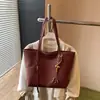 Bolso de Cuero Suave Retro de Gama Alta para Mujer 2026 Nuevo Bolso Tote Práctico Bolso de Hombro Bolso de Mano de Venta Caliente Transfronteriza Color Sólido