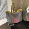 Bolsa de Lona Diseño de Nicho Ins Sentido Avanzado Gran Capacidad para Viajar al Trabajo Bolso de Hombro Estudiante Femenina Coreano Rayado Bolsa de Clase