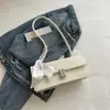 Bolsa de axila de alta apariencia para mujer, Nuevo estilo Primavera/Verano, Elegante bolso de hombro de bufanda de seda, Moda de comercio exterior, Bolso cuadrado pequeño versátil retro
