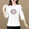 Camiseta de manga tres cuartos para comercio exterior transfronterizo para mujeres de mediana edad, corte holgado, talla grande, que disimula la barriga, adelgazante, elegante y rejuvenecedor.