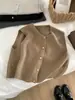 Chaleco tejido retro de cuello redondo con pequeños botones dorados, sin mangas, corte holgado, estilo coreano, versátil, adelgazante, adecuado para usar en capas en primavera y otoño.