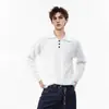 Camisa polo de punto de color liso texturizado de manga larga para hombre, marca de tendencia europea y americana, corte limpio, suéter versátil de cuello camisero para primavera y otoño