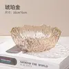 Tigela de frutas de plástico com aro dourado, de luxo leve, para uso doméstico, adequada para mesas de centro de sala de estar, com um design elegante e moderno, perfeita para guardar frutas e lanches