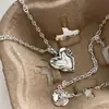 Colgante de Corazón de Lava Sólida Estilo Coreano y Japonés, Diseño Único, Moderno, de Alta Gama, Dulce y Fresco, Accesorio Versátil para Mujeres