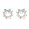 Pendientes de Botón de Perla con Lazo y Esmalte de Gota Dulce Moda Personalizada Nicho Elegante Personalizable Exquisitos Versátiles Pendientes Fábrica