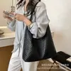 Bolso tote súper popular de gran capacidad, nuevo bolso de hombro casual de moda para mujer 2026, moderno y de alta gama para ir al trabajo este año