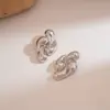 Pendientes de aro cruzados con forma de gota de agua, estilo minimalista transfronterizo europeo y americano, pendientes de nicho de alta gama, accesorios para orejas simples de personalidad retro, venta al por mayor