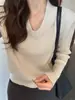 Suéter de punto sin mangas con cuello en V color albaricoque para mujer, nuevo estilo otoño e invierno 2026, adecuado para usar en capas o solo, top de punto ajustado