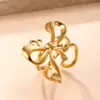 Anillo Popular Transfronterizo para Mujer, Anillo de Acero Inoxidable con Baño de Oro de 18 Quilates Moderno y de Alta Gama, Anillo de Acero de Titanio con Lazo Prensado en Aceite