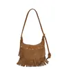 Bolso de Axila Estilo Denim de Nicho para Mujer Otoño 2025 Nuevo Bolso de Hombro Cruzado Bolso con Borlas Retro Bohemio