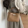 Bolso Tote Pequeño Súper Caliente para Mujer 2026 Nuevo Verano Popular de Gama Alta para Viajes Diarios Hombro Único Cruzado Bolso Cubo