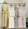 Conjunto de Tricô Tendência Outono/Inverno 2026: Cardigan com Capuz Liso de Cor Sólida + Calça Wide Leg