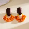 Pendientes de borla con carcasa de madera marrón transfronterizos europeos y americanos, pendientes de estilo vintage Maillard, pendientes de mujer de lujo ligero de alta gama