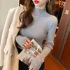 Camiseta térmica de punto negra para mujer con cuello medio alto, un top de manga larga ajustado que realza la figura para otoño e invierno, un suéter de punto