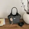 Bolso para el Trayecto al Trabajo para Mujer, Moda Trendy Nueva Primavera y Verano 2026, Sensación Exquisita y de Alta Gama, Bolso Cubo de Hombro Cruzado