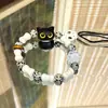 Pulseira de Corda Trançada Cerâmica Gato Caveira para Mulheres, Design de Nicho, Doce e Descolada Franja Estilo Chinês Pulseira Colorida Joia