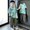 Roupa infantil verão nova algodão manga curta estampa de letras solta casual estilosa camiseta estampada para crianças mais velhas