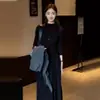 Vestido largo de punto negro de alta gama estilo francés para mujer, modelo nuevo de principios de otoño 2025, entallado a la cintura, vestido largo con capas interiores