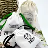 Bolsa de lona artística com cordão de 8 polegadas em estoque, bolsa de lona em branco para grafite, bolsa publicitária para instituições de treinamento, personalizável com designs impressos