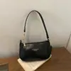 Colección de otoño 2026 de alta calidad, minimalista y elegante: un bolso de hombro chic y versátil con un toque sofisticado, perfecto para ventas transfronterizas