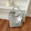 Bolso tote tejido de estilo europeo y americano de gran capacidad con colgante de encaje de estrella, bolso de hombro versátil para estudiantes, bolso de mano, bolso de axila