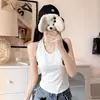Nuevo top sin mangas sexy de color liso estilo deseo puro con cuello halter sin espalda y almohadilla para el pecho incorporada, cómodo y adelgazante para mujer