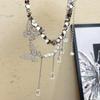 Collar de doble capa con diseño personalizado de gota de agua y lentejuelas de mariposa y perlas de diamante para chica dulce y genial. Cadena larga para clavícula.