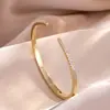RAKOL Moda Luxo Leve Cobre Incrustado Zircônia Trevo de Quatro Folhas Aberto Ajustável Pulseira Feminina Nicho Toque de Alto Padrão Joia de Mão